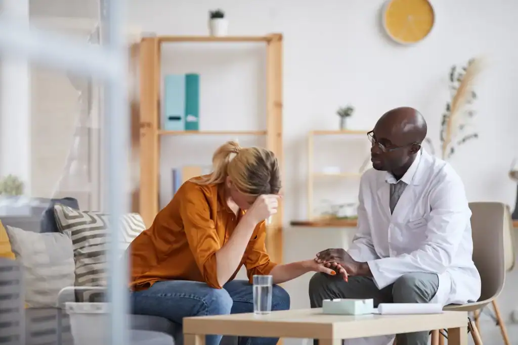 Anxious woman consulting with doctor, mental health support, Sierra Vista mental health services.